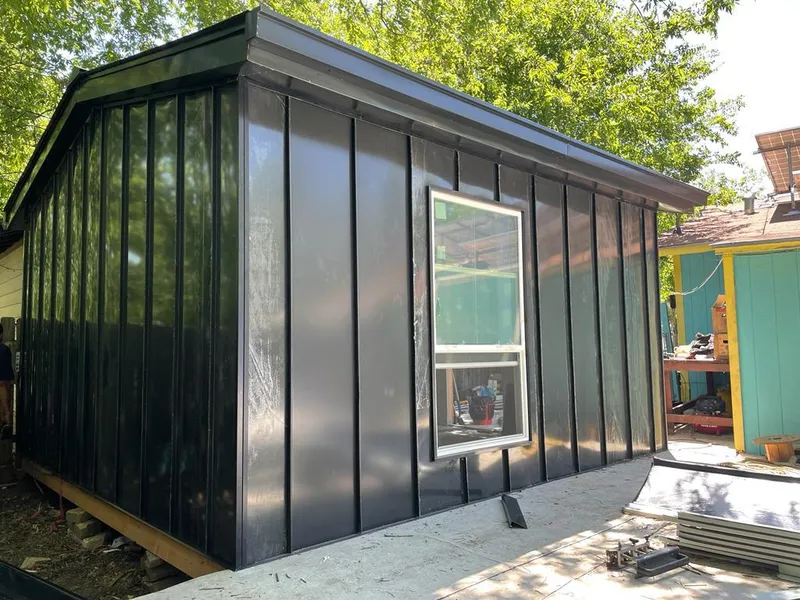 Black standing seam metal wall panels for Metal Roof Installation in Martins Ferry