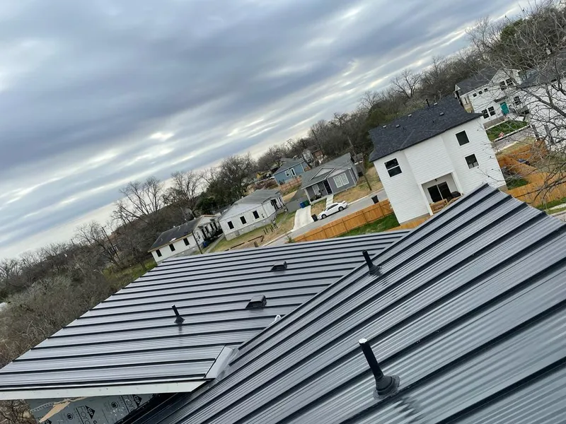 Standing seam metal roof panels with vents for Skylight Repair in Martins Ferry